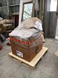 Chesterfield chair boxed and sat on a pallet, ready for international shipping