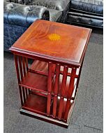 Revolving Bookcase with Polished top in Mahogany with fan marquetry and Tulip Inlay.