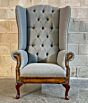 Chesterfield wingback chair, grey Herringbone textured weave with antique tan leather