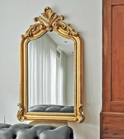 Antique gold baroque crested mirror