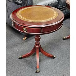 mahogany drum table with gold leather