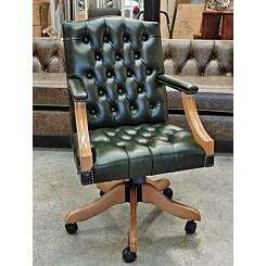 Gainsborough swivel chair burnt oak with classic green leather