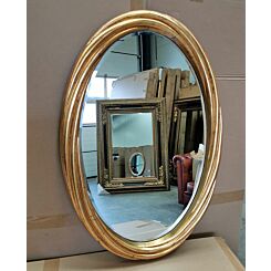 Trendy antiek goud omrande spiegel met facet geslepen glas.
