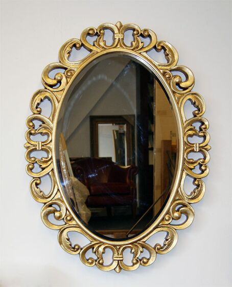 Grand miroir ovale de style baroque