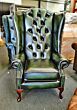 antique green high back Chesterfield wing chair